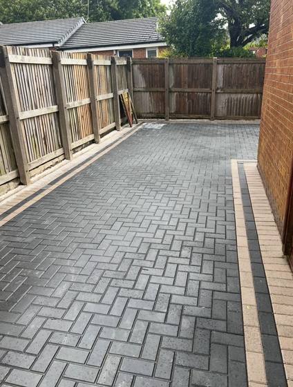 Herringbone block paving side driveway